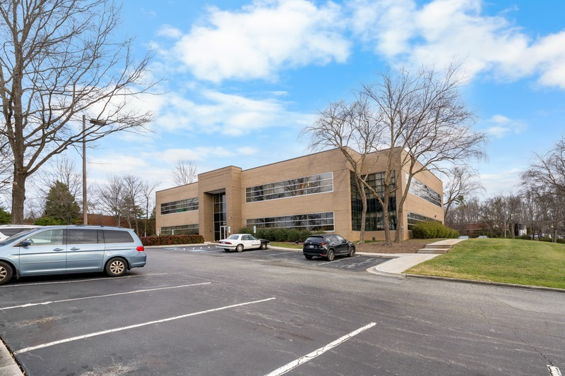 Side view of the office building and parking area